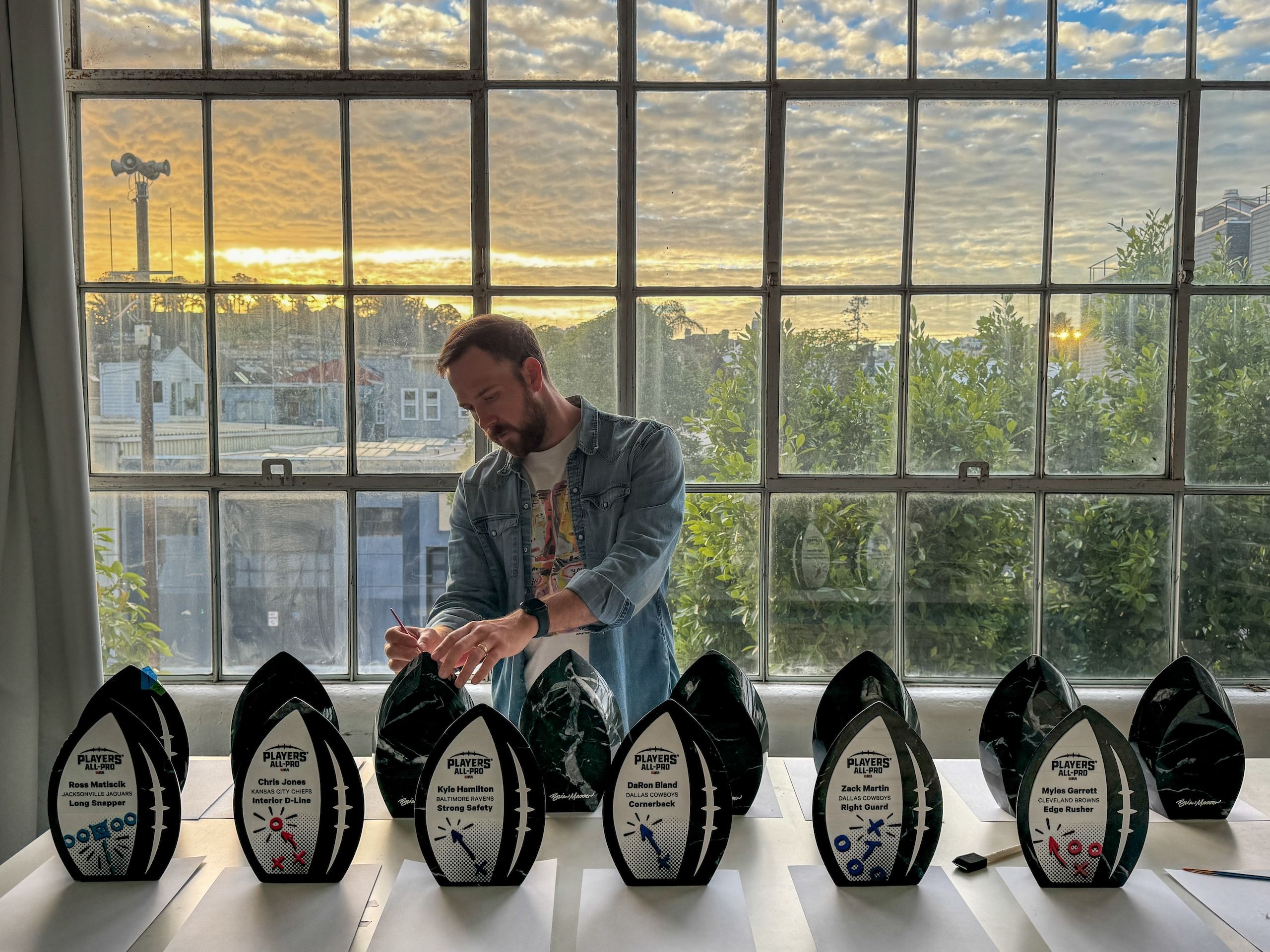 Brian Madden arranging the NFLPA-PAP awards